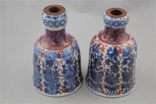 Two Chinese underglaze blue and iron red enamelled bell shaped huqqa bases, Kangxi period, 18cm. and 18.5cm.